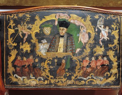 Depiction of Bishop-Rector of University, detail from back of painted leather chair from College of St Bartholomew in Salamanca, Spain by Spanish School