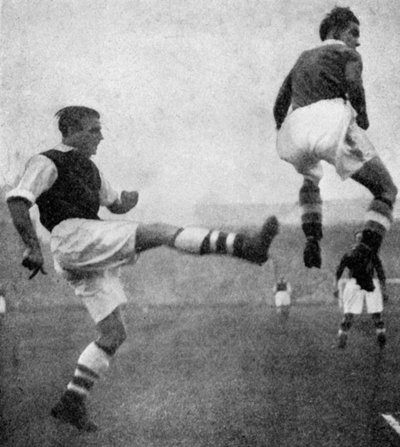 Action from an Arsenal v Chelsea football match, c1936-c1944 by Sport and General