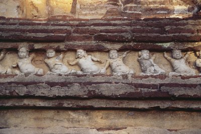 Relief depicting dwarves on the exterior of the Thivanka Image House by Sri Lankan