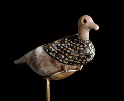 Duck shaped lamp made with a shell inlaid with lapis lazuli, red limestone and mother of pearl. 3000 BC. Baghdad, National Iraq Museum by Sumerian Sumerian