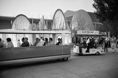Electric carts shuttle visitors at Seattle World