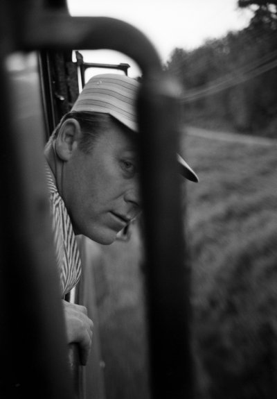 Engineer of the Great Northern Railroad Looks Out from Window of Cab of EMD E7 Locomotive by Ted Spiegel