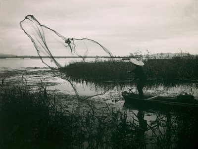 Japanese Fisherman Casting His Nets on a Lake, circa 1900 - 1915 by Teijiro Takagi