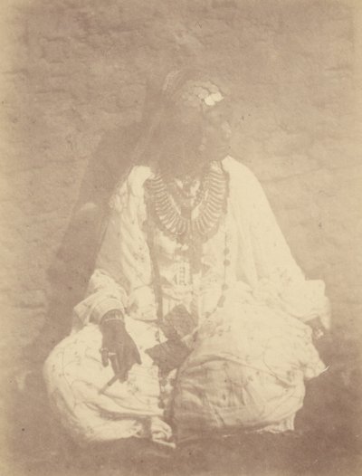 Portrait of a North African Woman Sitting Against a Wall by Théodule Devéria