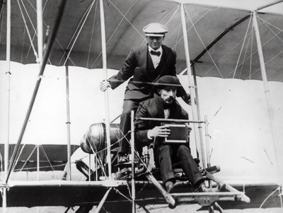 Thomas E. Grant with Mr Lewis Turner in a Flying Machine to Photograph the Eclipse, 1912 by Thomas E. and Horace Grant Grant
