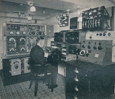 A Marconi wireless operator receiving wireless messages as the Empress of Britain crosses the Atlantic by Unbekannt