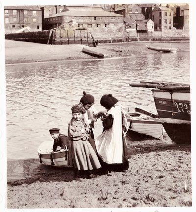 Children playing by the water