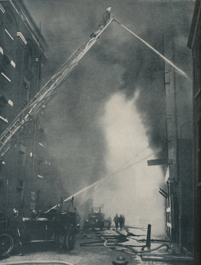 Massed Forces of the Modern Fire-Fighter Pitted Against a City Blaze by Unbekannt