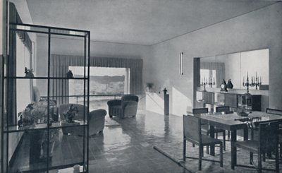 Paniconi and Pediconi. A dining room with a large window and curtains designed to frame a beautiful by Unbekannt