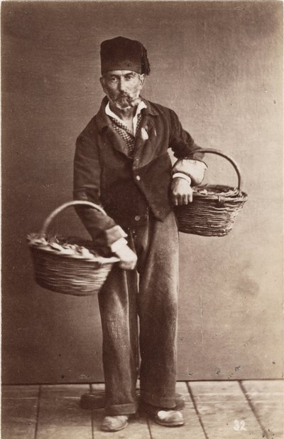 Small metiers: portrait of a fish monger, baskets loads of fish by Unbekannt