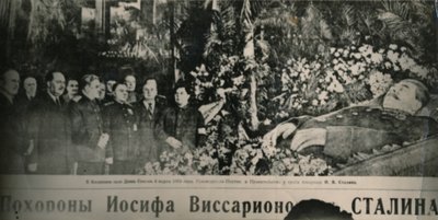 Soviet leaders visit the flower-decked bier of Stalin in Moscow