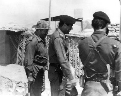 Taha Yassin Ramadan and Saddam Hussein inspecting the Basra front, Iraq, February 1987 by Unbekannt