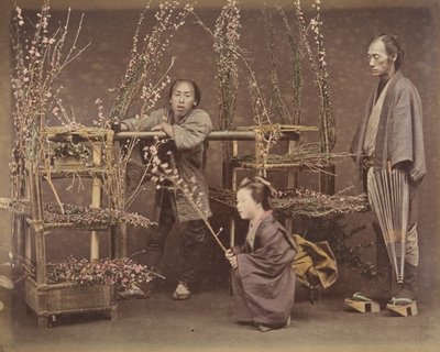Two Japanese Men and One Japanese Woman Posing with Flowering Branches, 1870s by Unbekannt