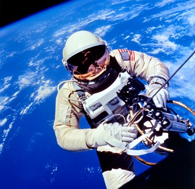 US Astronaut Edward H. White II Carrying Out External Tasks by Unbekannt