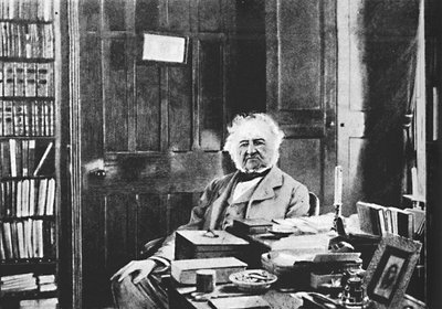 William Gladstone - The Grand Old Man Seated At His Study Table by Unbekannt
