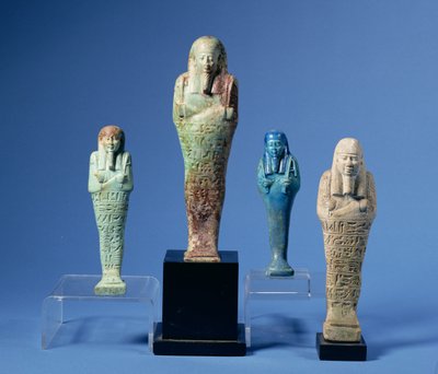 Four green or blue glazed Shabti figures, three with horizontal bands of hieroglyphic inscription, Egyptian by Unbekannt