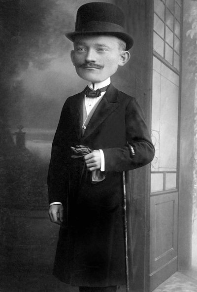 Portrait of a very elegant man with a giant