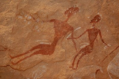 Rock art, Prehistory: Detail of a rock painting of two characters in an ornate shelter, in the Uweinat massif, Egypt (Period from 8000 to 3000 years BC). Photography by Unbekannt