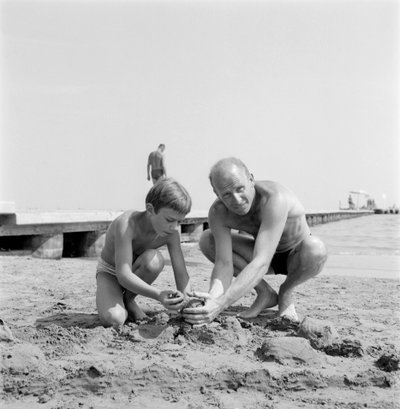 The Director Albert Lamorisse with His Son the Actor Pascal Lamorisse at the Venice Lido Beach - 1960 by Unbekannt