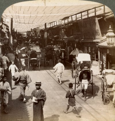 Midsummer Traffic Under the Awnings of Shijo Bashidori, a Busy Thoroughfare of Kyoto, Japan by Underwood and Underwood