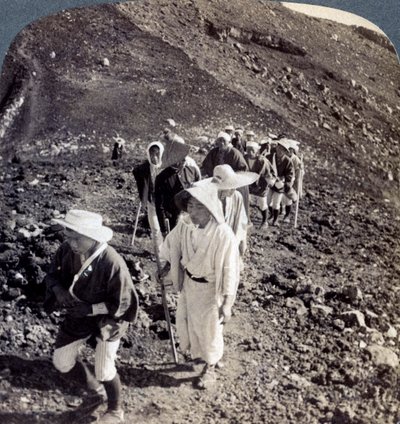 Pilgrims at the end of their ascent of Mount Fuji, Japan by Underwood and Underwood