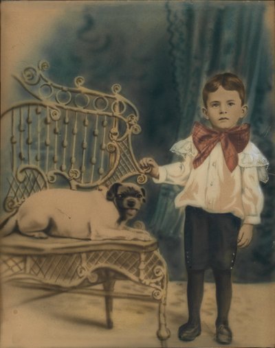 Boy with Dog on Chair by Unidentified