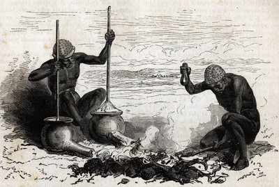 Blacksmiths Lakoutas (tribe located in the Upper Nile region), a forked wood branch serves as pliers, two stones serve as hammer and anvil, two earthen pots with long tubes at their base serve as bellows for charcoal fire, the pots are firm by a piece of s by Unknown artist