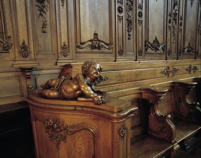 Baroque architecture: wooden stall representing an angel, attribute of the evangelist Saint Matthew. Choir (18th century) of the Church of St. Stephen. Internal view. Marmoutier, Bas Rhin by Unknown artist