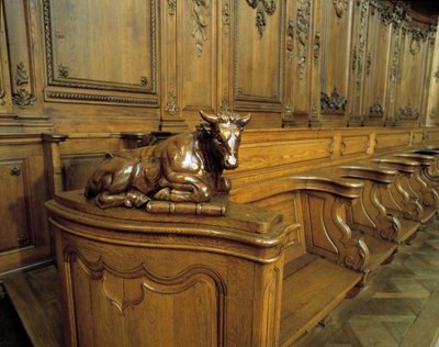 Baroque architecture: wooden stall representing an ox, attribute of the evangelist Saint Luke. Choir (18th century) of the Church of St. Stephen. Internal view. Marmoutier, Bas Rhin by Unknown artist