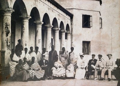 King Prempeh and Court with Dr. de Groot and Mrs. de Groot at Gold Coast Castle by Unknown photographer