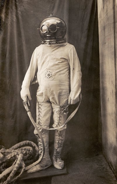 Man with Diving Suit to Protect Him from Fire by Unknown photographer