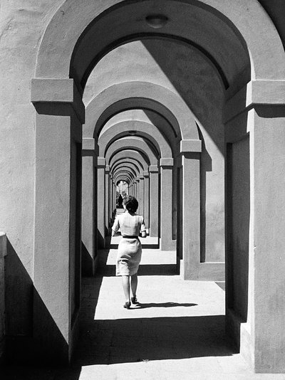 Young Woman Passing Under a Portico by Vincenzo Balocchi