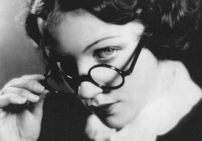 Portrait of Elma Bulla with Black rimmed glasses by Walter Limot