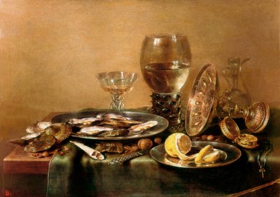 Still life composed of oysters, lemon, glass and gold tableware by Willem Claesz. Heda