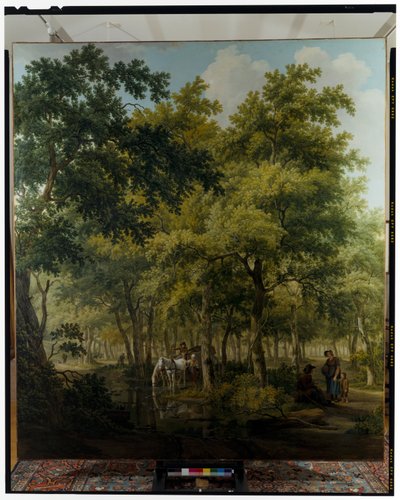 Peasants with a Cart Near the Bank of a River in a Woodland Scene by Willem Uppink