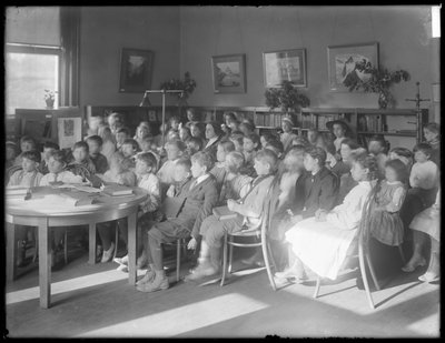 Children Seated, Listening in the Reading Room of an Unidentified Branch of the Queens Borough Public Library by William Davis Hassler