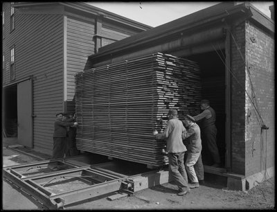 Removing Lumber Intended for Use in Casket Manufacture from the Dry Kiln, Oneida, New York by William Davis Hassler