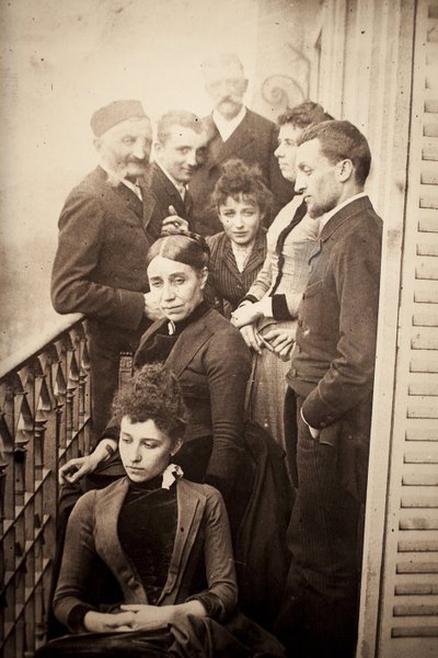 The Claudel Family, Jessie Lipscomb, Ferdinand de Massary and His Father on the Balcony of the Apartment of 31 Boulevard de Port Royal. (In the Foreground: Louise (b. 1866), Behind Her, Madame Claudel (b. Louise Athanaise Brains in 1840) and Camille (1864- by William Elborne