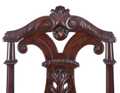 (Detail) of a pair of George II hall chairs, executed by James Moore the Younger by William Kent