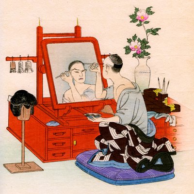 Traditional Japanese theater: an actor performs makeup in his dressing room by Yoshimune Arai