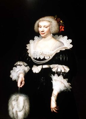 Portrait of a lady in a black dress with lace collar and cuffs
