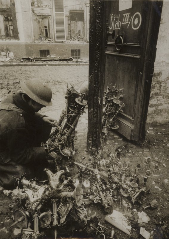 Candlesticks Tied in Bundles, Ready for Removal by the Germans, but Left Behind by (after) English photographer