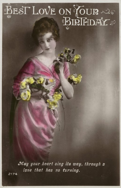Girl dressed in kimono-like dress with flowers by (after) English photographer