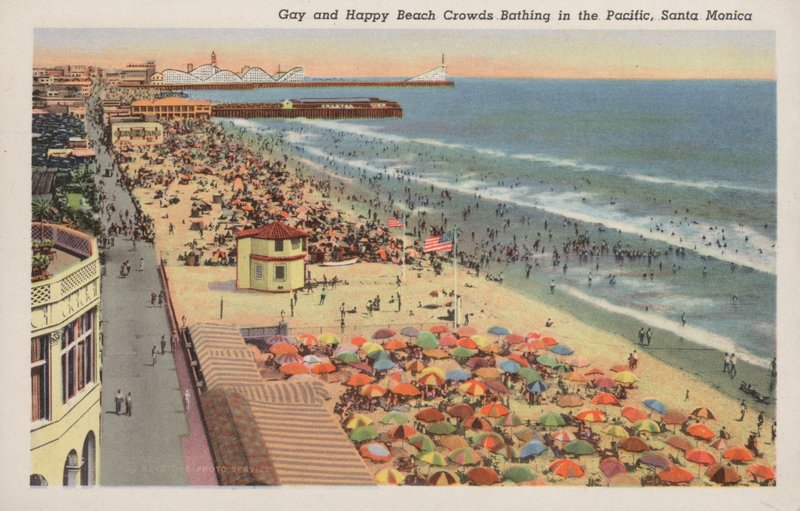 Gay and happy beach crowds bathing in the Pacific, Santa Monica by American Photographer