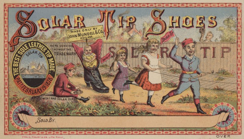 Children Pulling Baby in Shoe by American School