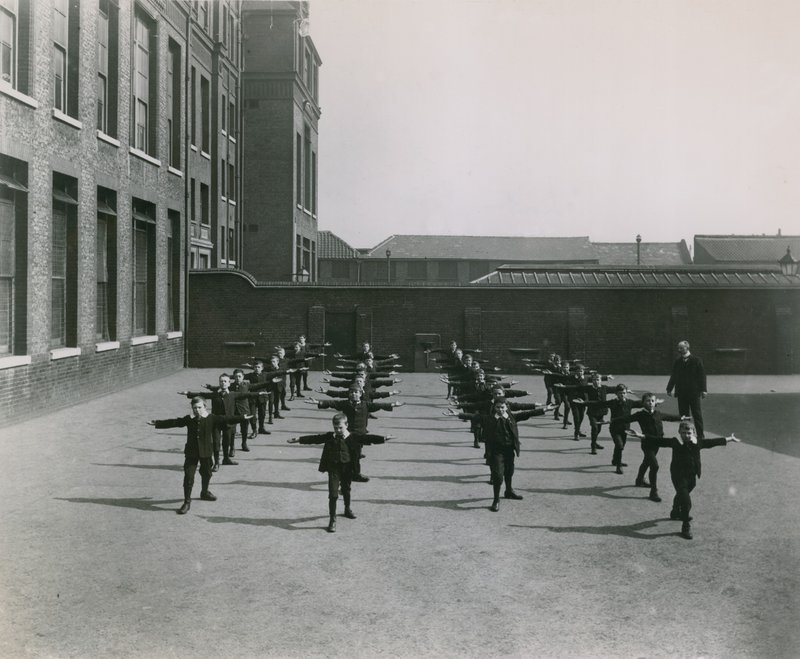 Children in the Schoolyard by English Photographer