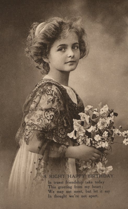 Girl with a posy of flowers and a birthday greeting by English Photographer