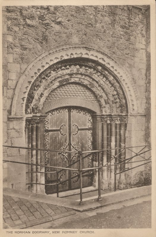 Norman doorway of St Nicholas Church, New Romney, Kent by English Photographer