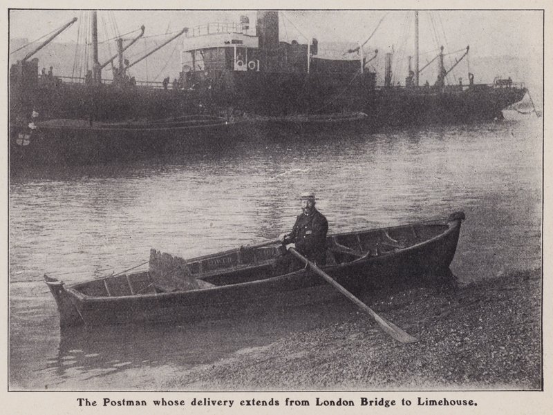 Postman whose delivery extends from London Bridge to Limehouse in a boat on the River Thames, London by English Photographer
