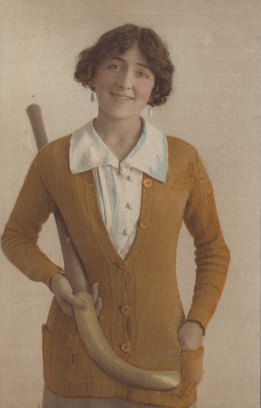 Pretty Girl, in Knitted Jumper, with Pearl Earrings, Holding Hockey Stick by English Photographer
